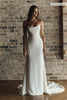 A woman wears a structured corset-style bodice and a long wedding skirt_XS_
