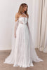 Woman wearing a lace wedding dress with sheer sleeves_XS_