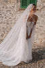 Woman in a lace wedding dress with a mantilla veil_XS_