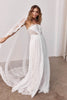 Woman wearing a lace wedding dress with a long veil_XS_