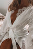 Close up selfie of a woman in a satin bridal robe