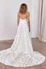 Woman wearing a lace wedding dress with a long train_XS_