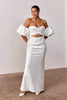 Woman wearing a satin strapless wedding dress_L_