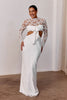 Woman wearing a long sleeve lace wedding dress_L_