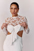 A lace wedding dress with bow detail_L_