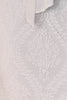 Close-up of Milan's lace fabric