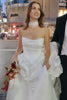 Model wearing a bridal neckscarf and wedding dress