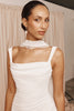 Model wearing a bridal neckscarf and wedding dress