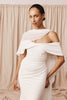 Woman in a wedding dress and sheer bridal cape