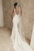 Long embroidered wedding veil with crepe wedding gown