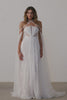 A woman wearing a strapless lace wedding dress