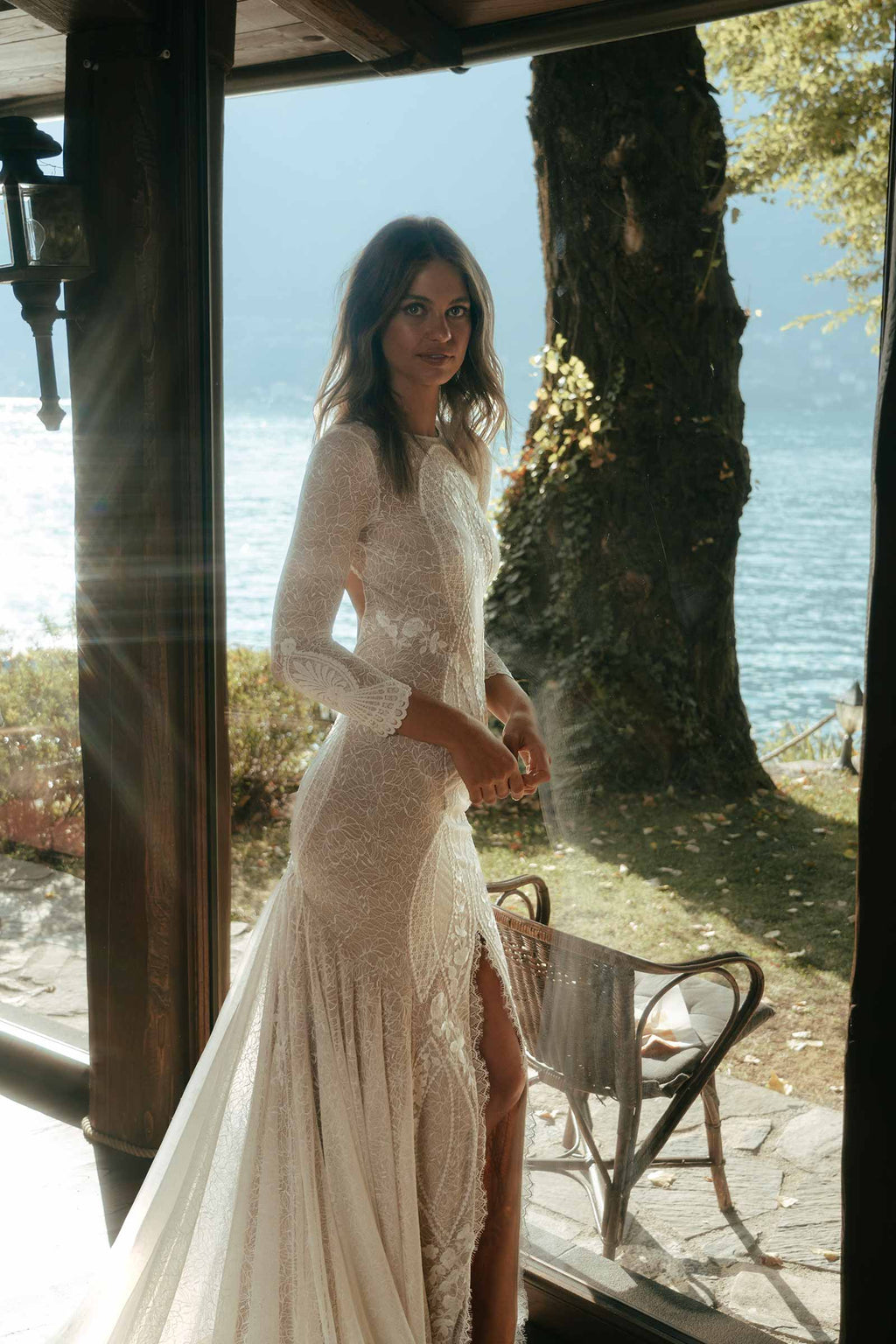 Model in Pierlot with Italian coastal line in background